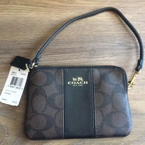 Coach Wristlet I’m far Signature and black